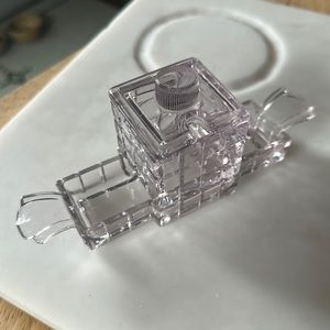 Partial condiment set by HEISEY, purple glass